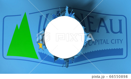 Hole cut in the flag of Juneau city capital 66550898