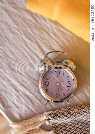 Antique clock in cloth background. 66552480