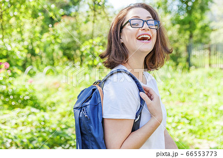 Happy beautiful positive student girl in Happy beautiful positive student girl in 66553773
