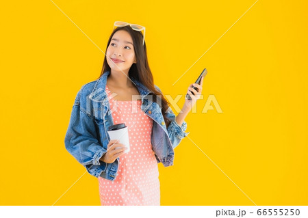 woman using laptop computer with smart mobile phone and credit card for online shopping woman using laptop computer with smart mobile phone and credit card for online shopping 66555250