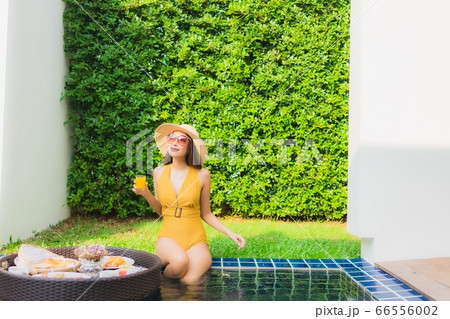 woman using laptop or computer noterbook on sofa with concept work from home woman using laptop or computer noterbook on sofa with concept work from home 66556002