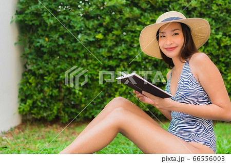 woman using laptop or computer noterbook on sofa with concept work from home woman using laptop or computer noterbook on sofa with concept work from home 66556003