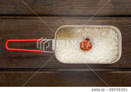 おかゆ　Rice porridge made with aluminum outdoor pot 66556361