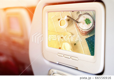 Aircraft monitor in front of passenger seat Aircraft monitor in front of passenger seat 66556916