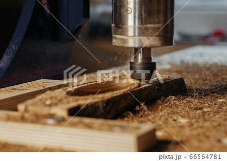 Machine tool in wood factory with drilling cnc machines. Computer numerical control Machine tool in wood factory with drilling cnc machines. Computer numerical control 66564781
