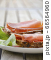 Brown bread with smoked ham 66564960