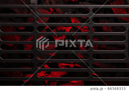 Metal barbecue grill over hot coal Metal barbecue grill over hot coal 66568353