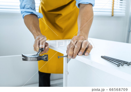 Craftsman doing renovation work at home Craftsman doing renovation work at home 66568709