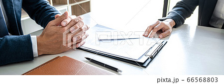 Image of business woman hand sending a resignation 66568803