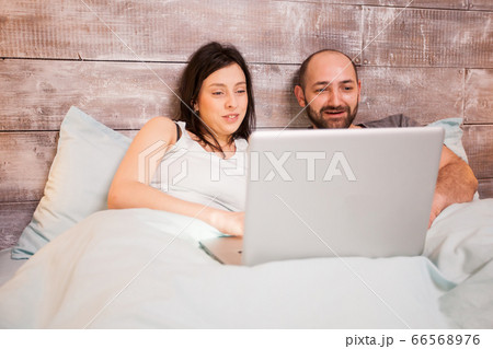 Married young couple in pajamas Married young couple in pajamas 66568976