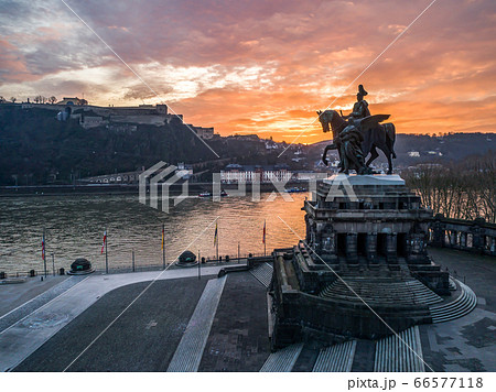 Colorful Sunrise burning sky Koblenz City historic monument German Corner where river rhine and mosele flow together Colorful Sunrise burning sky Koblenz City historic monument German Corner where river rhine and mosele flow together 66577118