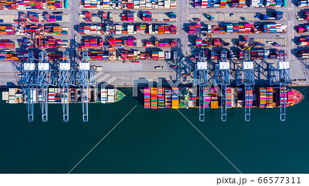 Container ship at industrial port in import export 66577311