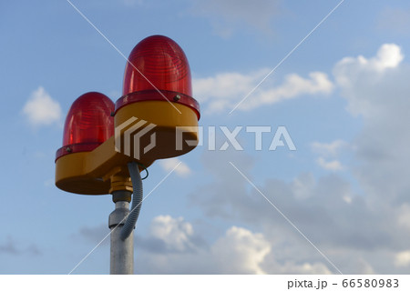 Safety lights on top of a building - to warn planes. Aviation lights. Safety lights on top of a building - to warn planes. Aviation lights. 66580983