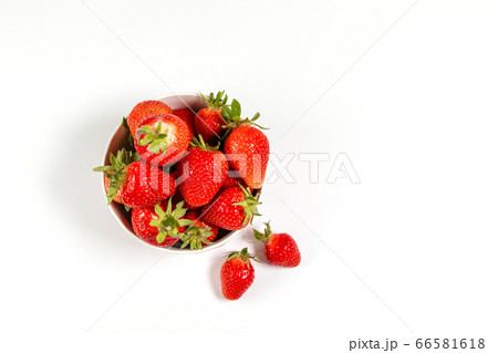 Bowl with fresh strawberries on white background Bowl with fresh strawberries on white background 66581618