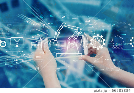 Smart industry concept with person using smartphone 66585884