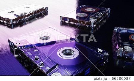 Audio cassettes on the blue wooden surface. Retro music concept. 3d rendering. Audio cassettes on the blue wooden surface. Retro music concept. 3d rendering. 66586087