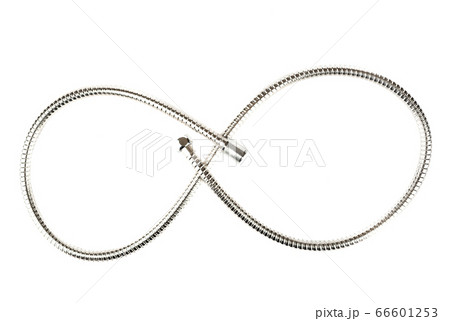 Curve made of corrugated stainless steel shower hose with connectors on a white background. Curve made of corrugated stainless steel shower hose with connectors on a white background. 66601253