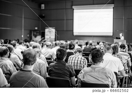 Speaker giving presentation on scientific business conference. Speaker giving presentation on scientific business conference. 66602502
