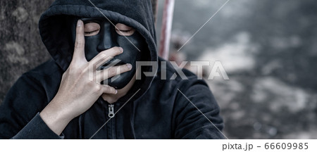 Mystery man in black mask feeling stressed Mystery man in black mask feeling stressed 66609985