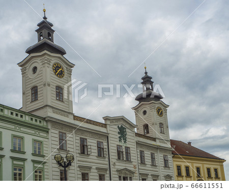 front of town hall palace with two towers with clock in city Hradec Kralove in Czech republic 66611551