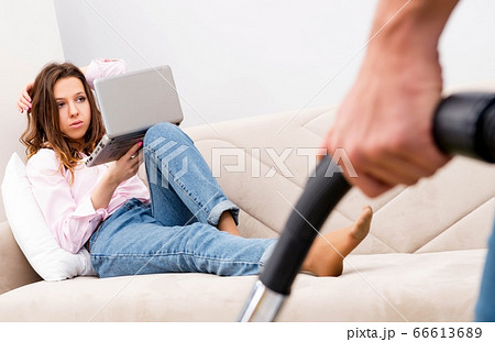 Young family doing cleaning at home 66613689