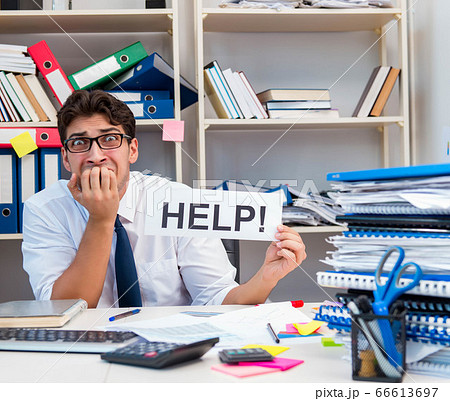 Busy frustrated businessman angry in the office 66613697