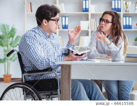 Disabled student studying and preparing for college exams 66615506