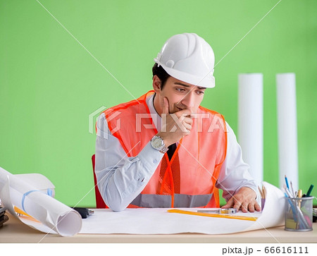 Man architect working on the project 66616111
