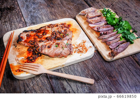 T-bone steak medium-rear steak with sliced beef on T-bone steak medium-rear steak with sliced beef on 66619850
