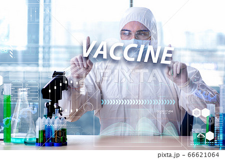 Man doctor working on coronavirus covid-19 vaccine Man doctor working on coronavirus covid-19 vaccine 66621064