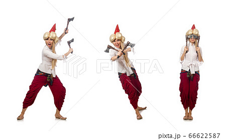 Young woman with tomahawk in hand 66622587