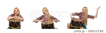 Woman with drum isolated on white 66622588