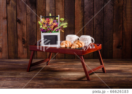 Delicious breakfast with fresh croissants and ripe Delicious breakfast with fresh croissants and ripe 66626183