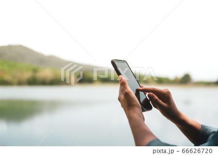 Womanhand using smartphone to do work business, Womanhand using smartphone to do work business, 66626720