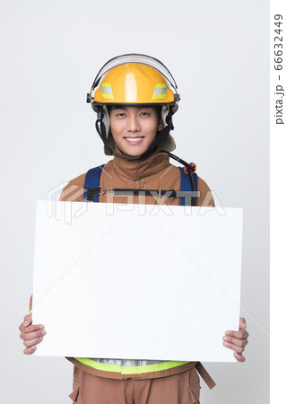 Asian male and female firefighter portrait, young smiling fireman in uniform 406 Asian male and female firefighter portrait, young smiling fireman in uniform 406 66632449