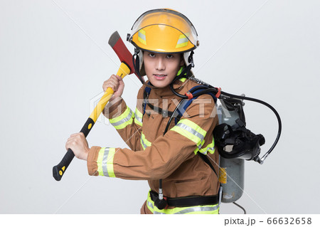 Asian male and female firefighter portrait, young smiling fireman in uniform 397 Asian male and female firefighter portrait, young smiling fireman in uniform 397 66632658