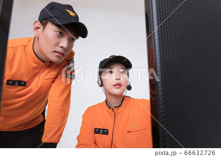 Asian male and female firefighter portrait, young smiling fireman in uniform 271 66632726