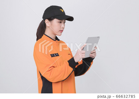 Asian male and female firefighter portrait, young smiling fireman in uniform 194 Asian male and female firefighter portrait, young smiling fireman in uniform 194 66632785