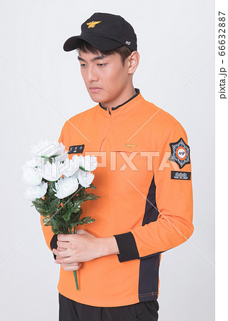 Asian male and female firefighter portrait, young smiling fireman in uniform 091 66632887