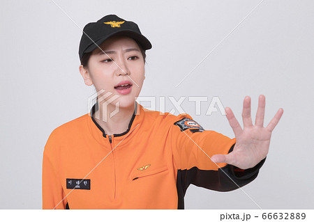 Asian male and female firefighter portrait, young smiling fireman in uniform 241 Asian male and female firefighter portrait, young smiling fireman in uniform 241 66632889