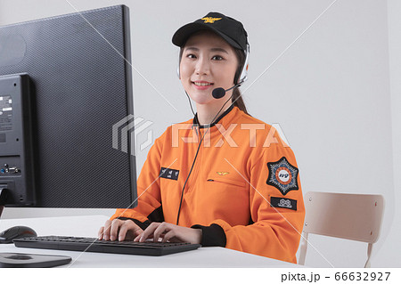 Asian male and female firefighter portrait, young smiling fireman in uniform 226 66632927