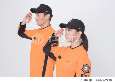 Asian male and female firefighter portrait, young smiling fireman in uniform 084 Asian male and female firefighter portrait, young smiling fireman in uniform 084 66632940