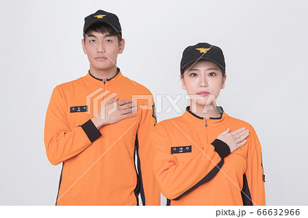 Asian male and female firefighter portrait, young smiling fireman in uniform 133 Asian male and female firefighter portrait, young smiling fireman in uniform 133 66632966