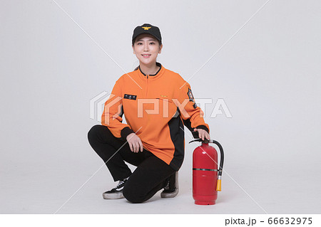 Asian male and female firefighter portrait, young smiling fireman in uniform 207 66632975