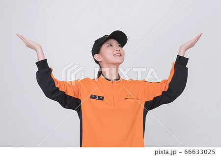 Asian male and female firefighter portrait, young smiling fireman in uniform 159 Asian male and female firefighter portrait, young smiling fireman in uniform 159 66633025