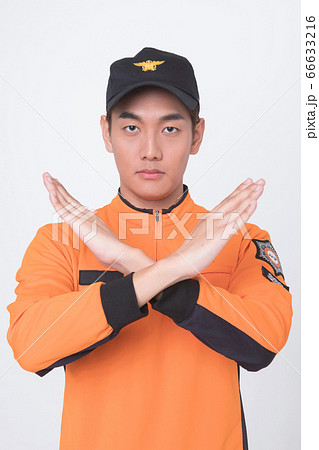 Asian male and female firefighter portrait, young smiling fireman in uniform 002 Asian male and female firefighter portrait, young smiling fireman in uniform 002 66633216