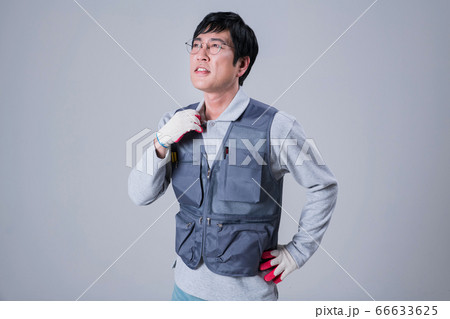 A studio portrait of Asian man making a confident smile 444 66633625