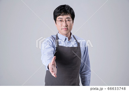 A studio portrait of Asian man making a confident smile 338 A studio portrait of Asian man making a confident smile 338 66633748