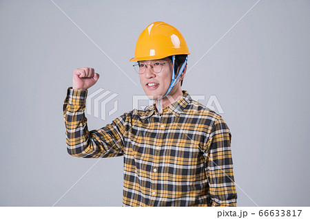 A studio portrait of Asian man making a confident smile 379 A studio portrait of Asian man making a confident smile 379 66633817
