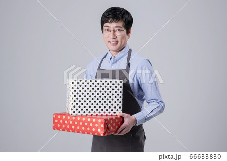 A studio portrait of Asian man making a confident smile 348 66633830